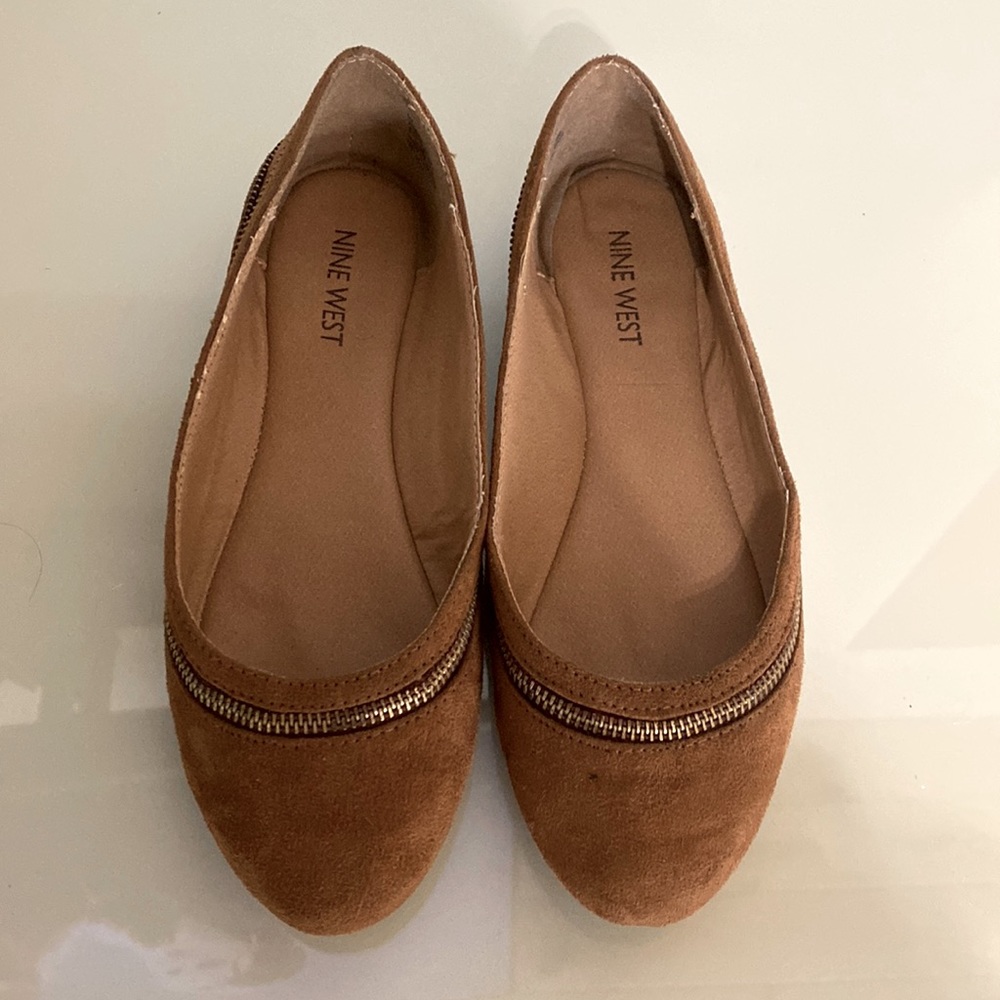 Gently worn Nine West suede camel flats with zipper accent